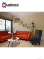 طقم كنب عصري لغرفة المعيشة بألوان حديثة وتصميم أنيق
