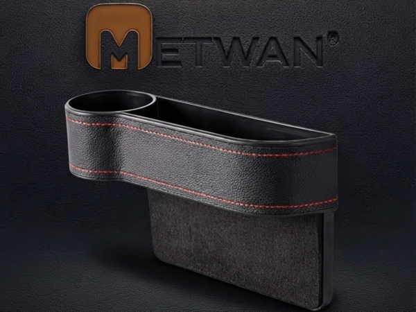 Side view of a black leather car seat organizer featuring a built-in cup holder and stylish red stitching detail