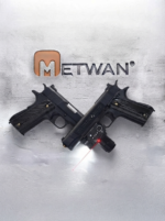 Two black Colt M1911 style pistols in a cross formation with a mounted laser sight and flashlight attachment
