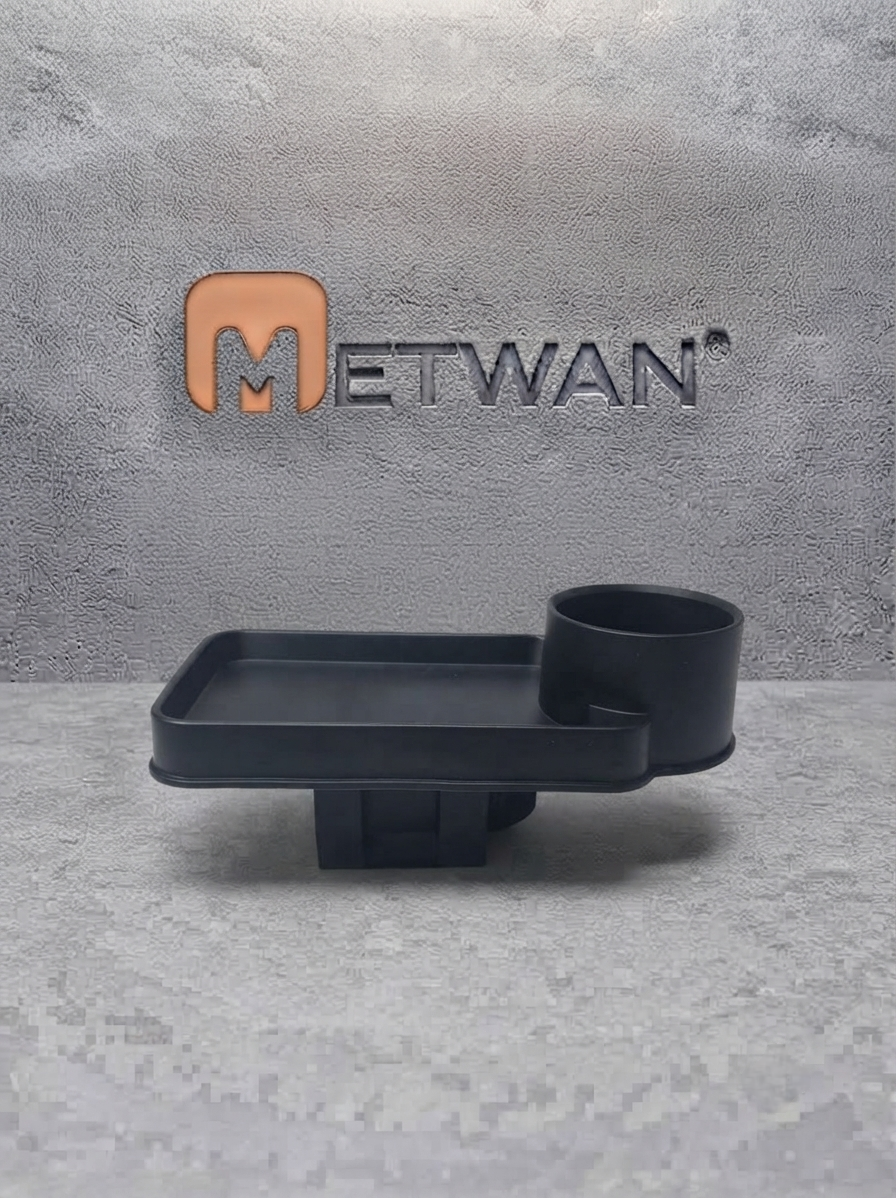 Front view of a black car cup holder with a detachable food tray