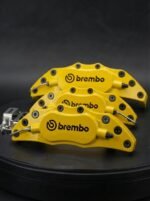 ⁦طقم أغطية كاليبر فرامل Brembo Racing ألمنيوم مع قواعد مخصصة بنوع السيارة لون أصفر⁩ - الصورة ⁦2⁩
